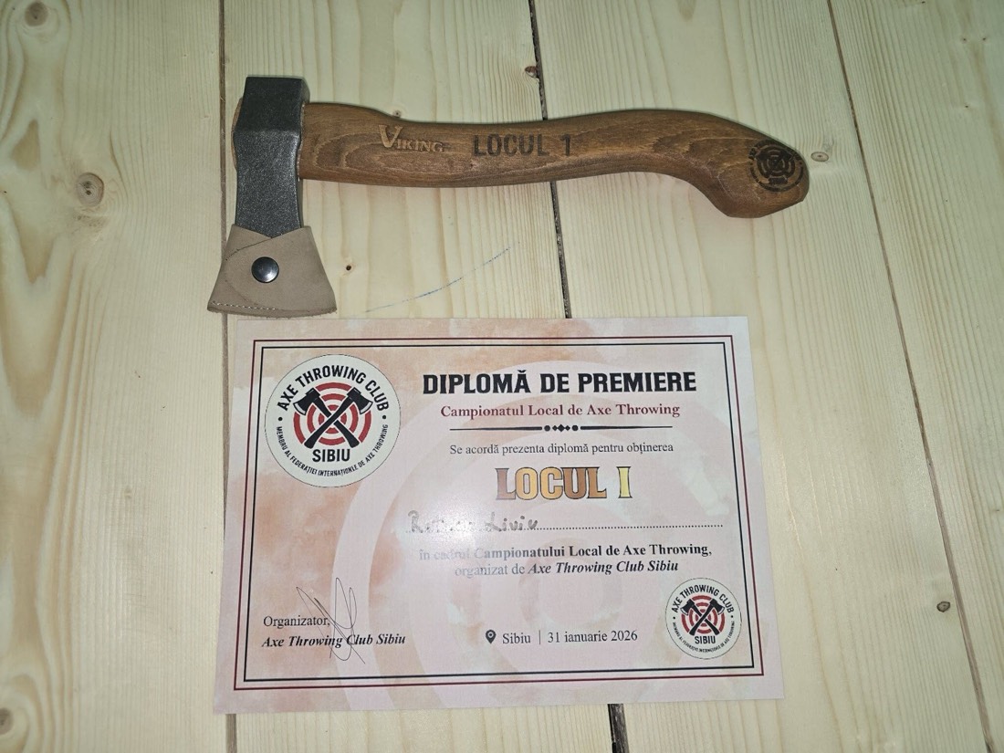 Topor gravat cu „Locul 1” și diploma de premiere de la un concurs al clubului